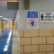 Signs in a hallway at King Elementary School encourage social distancing as the school works to maintain a safe environment during the coronavirus pandemic on September 08, 2020 in Chicago, Illinois.